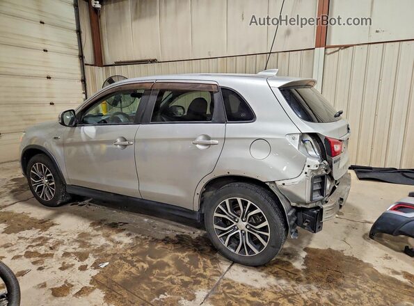 JA4AP3AU8KU020019 2019 MITSUBISHI OUTLANDER Silver Trasero izquierdo