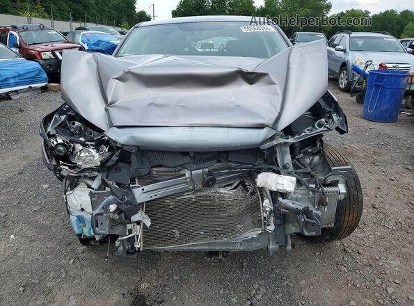 JA4AP3AUXKU034083 2019 MITSUBISHI OUTLANDER Серебряный Вид спереди