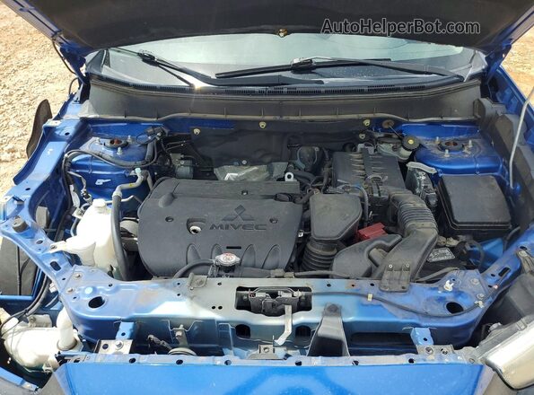 JA4AP4AW2JU024802 2018 MITSUBISHI OUTLANDER Blue Vista del compartimento del motor