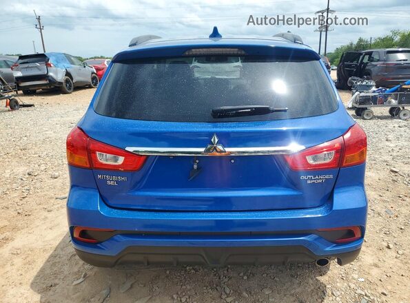 JA4AP4AW2JU024802 2018 MITSUBISHI OUTLANDER Blue Vista trasera