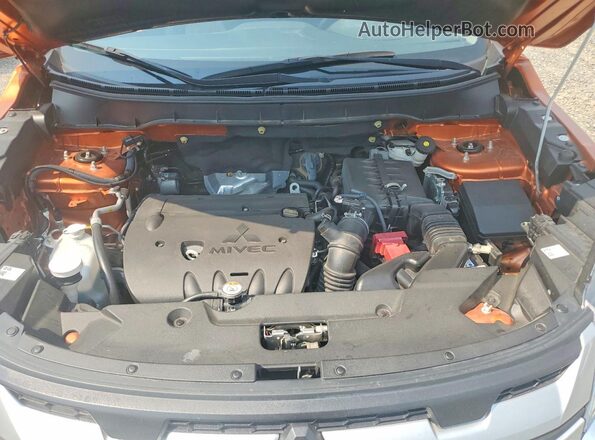 JA4APUAU8NU004381 2022 MITSUBISHI OUTLANDER Orange Widok komory silnika