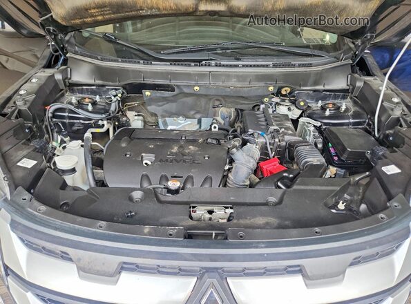JA4APUAUXMU005028 2021 MITSUBISHI OUTLANDER Black Vista de la etiqueta del VIN