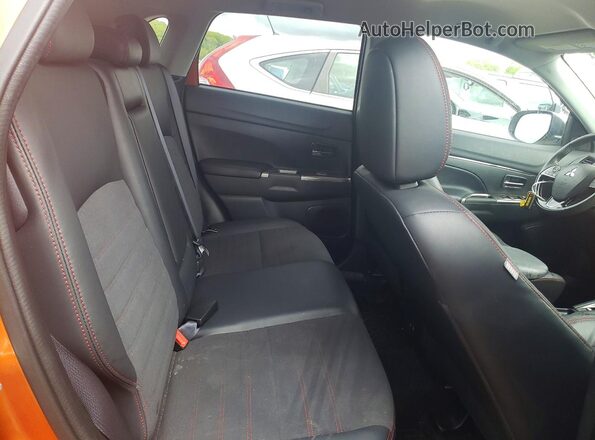 JA4APVAUXNU016019 2022 MITSUBISHI OUTLANDER Orange Rear seats view