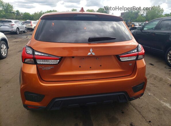JA4APVAUXNU016019 2022 MITSUBISHI OUTLANDER Orange Rear view