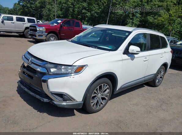 JA4AZ3A35JZ010616 2018 MITSUBISHI OUTLANDER White Vista tres cuartos delantera izquierda