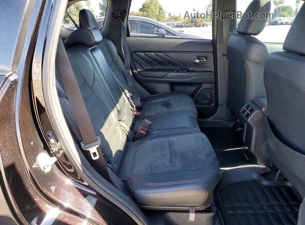 JA4J2VA78MZ000671 2021 MITSUBISHI OUTLANDER Maroon Rear interior view