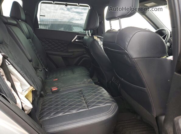 JA4J3VA85PZ042208 2023 MITSUBISHI OUTLANDER Silver Rear interior view