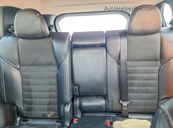 JA4J3VA89RZ067065 2024 MITSUBISHI OUTLANDER Silver Rear seats view