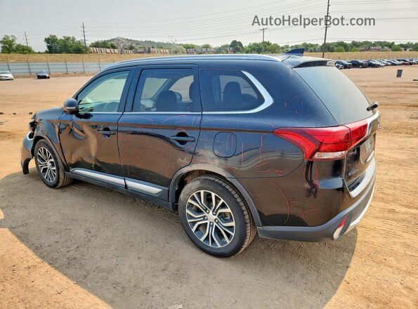JA4JZ4AX1JJ001709 2018 MITSUBISHI OUTLANDER Black Trasero izquierdo