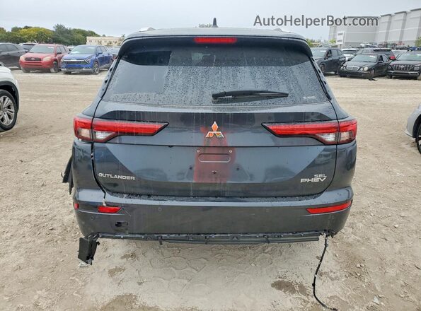 JA4T5WA92SZ011377 2025 MITSUBISHI OUTLANDER Gray Rear view
