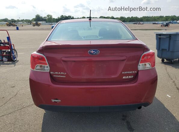 JF1GJAA63GH017736 2016 SUBARU IMPREZA Burgundy Rear view