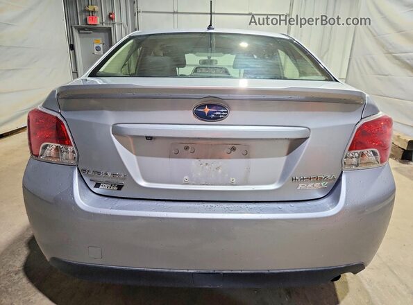 JF1GJAA65GH021609 2016 SUBARU IMPREZA Серебряный Вид сзади