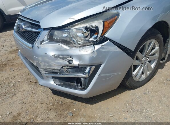 JF1GJAB66GH019608 2016 SUBARU IMPREZA Серебряный Вид спереди