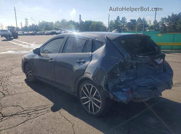 JF1GUAFC4R8303569 2024 SUBARU IMPREZA Gray Trasero izquierdo