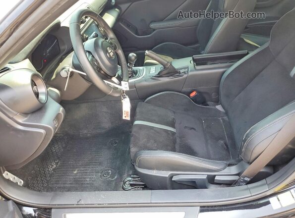JF1ZNBE10P9766067 2023 TOYOTA GR Purple Front interior view