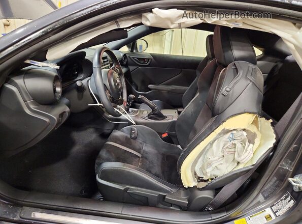 JF1ZNBE14P9763379 2023 TOYOTA GR Серый Вид салона спереди