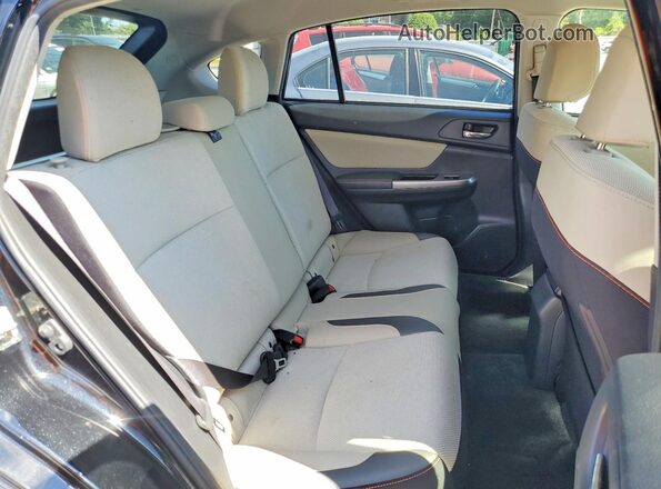 JF2GPABC4H8203396 2017 SUBARU CROSSTREK Black Rear interior view