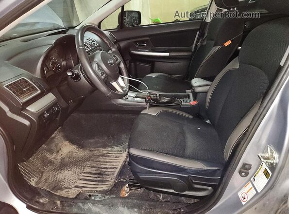 JF2GPABC7G8310988 2016 SUBARU CROSSTREK Silver Front interior view