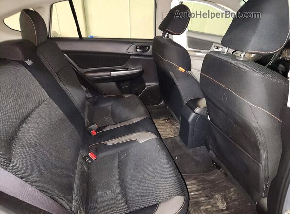 JF2GPABC7G8310988 2016 SUBARU CROSSTREK Silver Rear interior view