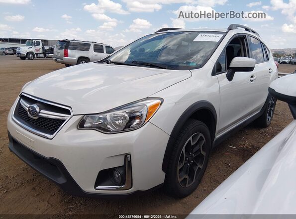 JF2GPADC0GH263624 2016 SUBARU CROSSTREK White Առջևի ձախ երեք քառորդ տեսարան