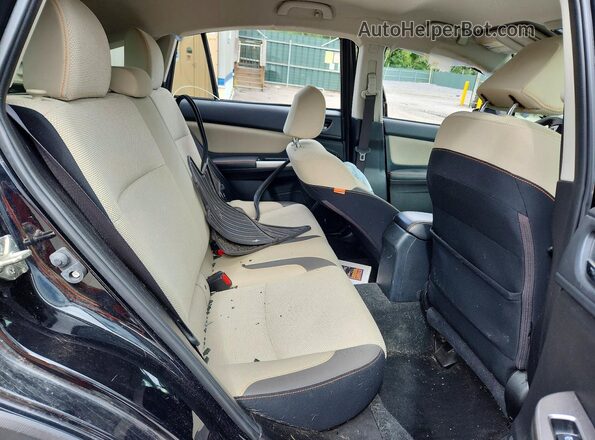 JF2GPADC9H8257189 2017 SUBARU CROSSTREK Black Widok wnętrza z tyłu