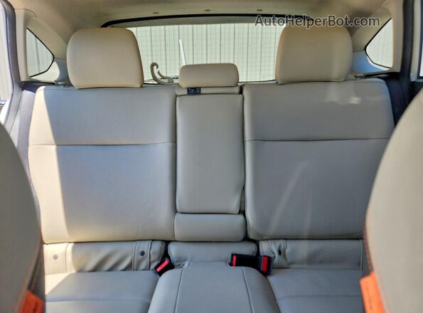 JF2GPAKC1GH281827 2016 SUBARU CROSSTREK White Rear seats view