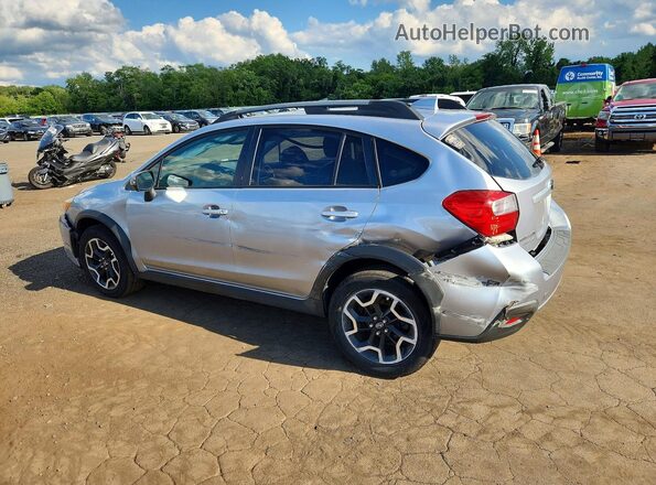 JF2GPANC0H8243129 2017 SUBARU CROSSTREK Silver Trasero izquierdo