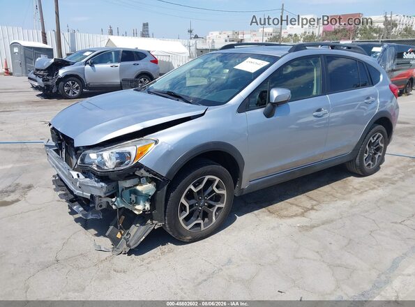 JF2GPANC1G8323599 2016 SUBARU CROSSTREK Silver Vista tres cuartos delantera izquierda