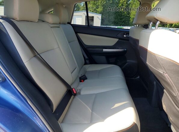 JF2GPANC4GH290498 2016 SUBARU CROSSTREK Blue Vista interior trasera