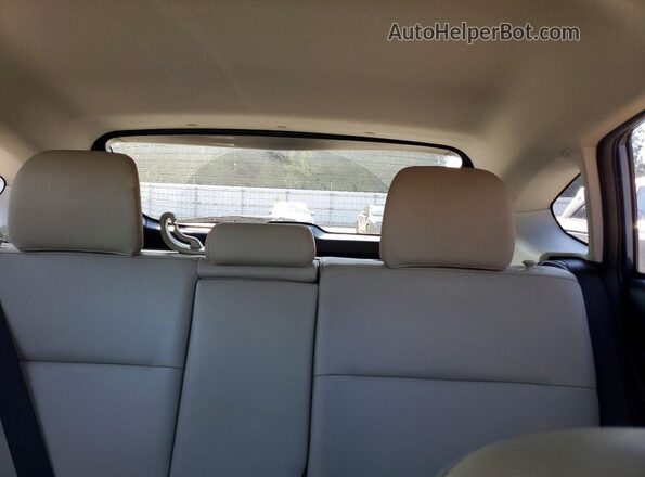 JF2GPANC4GH290498 2016 SUBARU CROSSTREK Blue Vista de los asientos traseros