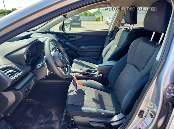 JF2GTAAC2JH213167 2018 SUBARU CROSSTREK Silver Front interior view