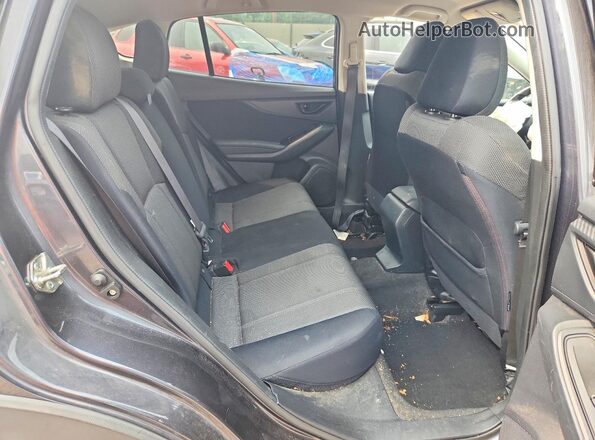 JF2GTAAC5KH332283 2019 SUBARU CROSSTREK Charcoal Rear interior view