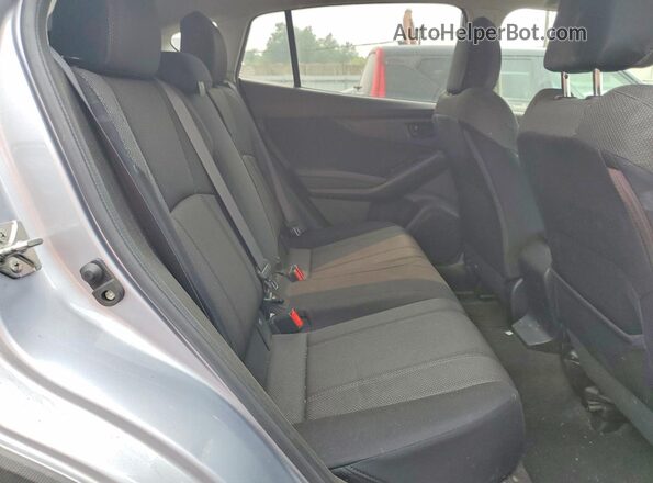 JF2GTAAC7JH268312 2018 SUBARU CROSSTREK Silver Rear seats view