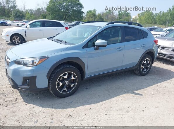 JF2GTABC0JH259241 2018 SUBARU CROSSTREK Light Blue Առջևի ձախ երեք քառորդ տեսարան