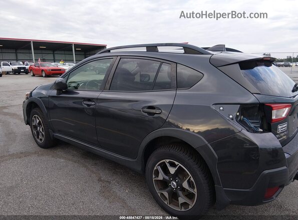JF2GTABC1JH261399 2018 SUBARU CROSSTREK Black Front view