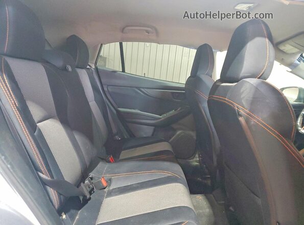 JF2GTABC5JH207877 2018 SUBARU CROSSTREK Silver Vista interior trasera