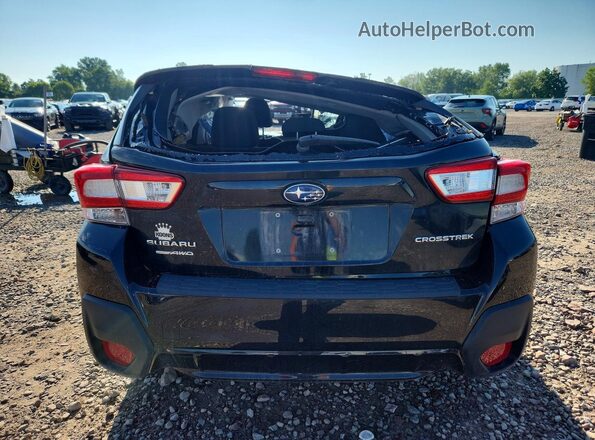 JF2GTABC7JH256871 2018 SUBARU CROSSTREK Black Rear view
