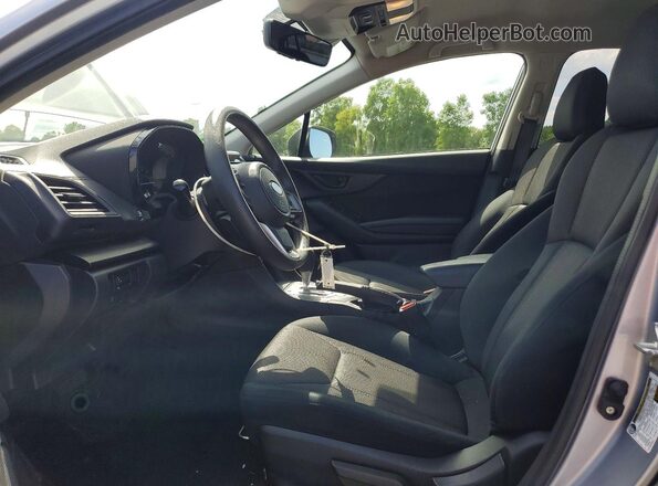 JF2GTABCXM8345094 2021 SUBARU CROSSTREK Серебряный Вид салона спереди