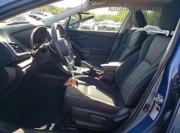 JF2GTACC6PG216567 2023 SUBARU CROSSTREK Blue Vista interior delantera