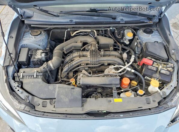 JF2GTACC9K8230949 2019 SUBARU CROSSTREK Blue Vista del compartimento del motor