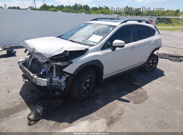 JF2GTADC0JH321489 2018 SUBARU CROSSTREK White Vista tres cuartos delantera izquierda