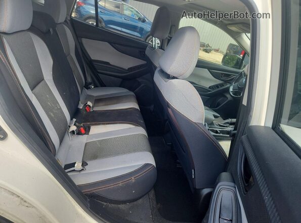 JF2GTADC1JH226973 2018 SUBARU CROSSTREK White Vista interior trasera