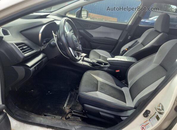 JF2GTADC1JH226973 2018 SUBARU CROSSTREK White Vista interior delantera