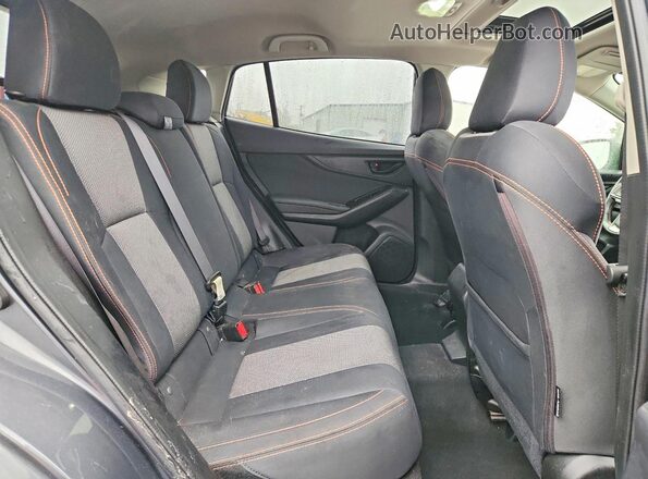 JF2GTAEC2M8321867 2021 SUBARU CROSSTREK Charcoal Vista interior trasera