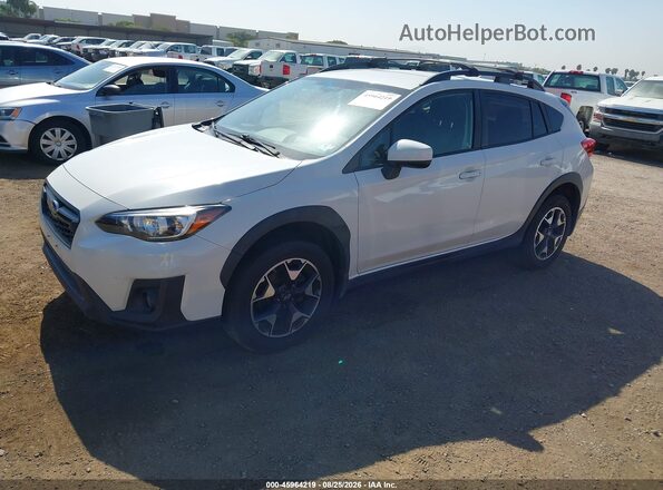JF2GTAEC3K8301818 2019 SUBARU CROSSTREK White Vista tres cuartos delantera izquierda