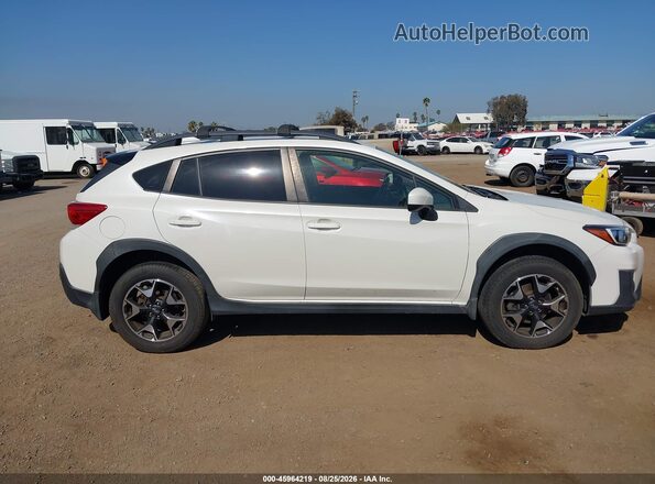 JF2GTAEC3K8301818 2019 SUBARU CROSSTREK White Vista interior trasera