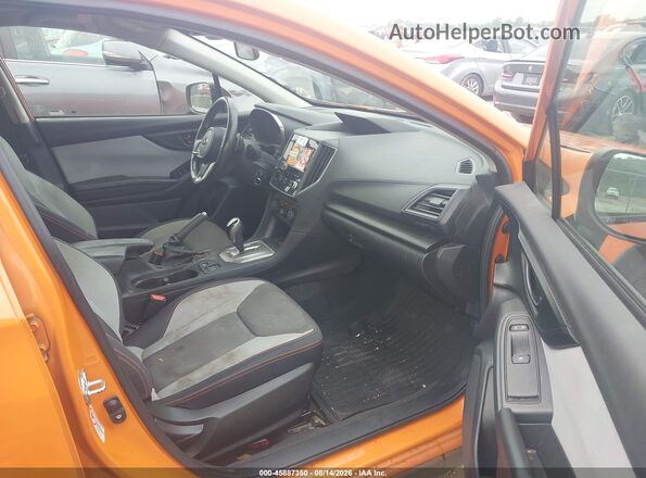 JF2GTAEC4K8348632 2019 SUBARU CROSSTREK Orange Front interior view