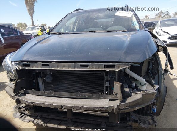 JF2GTAEC8KH365322 2019 SUBARU CROSSTREK Gray Vista interior trasera
