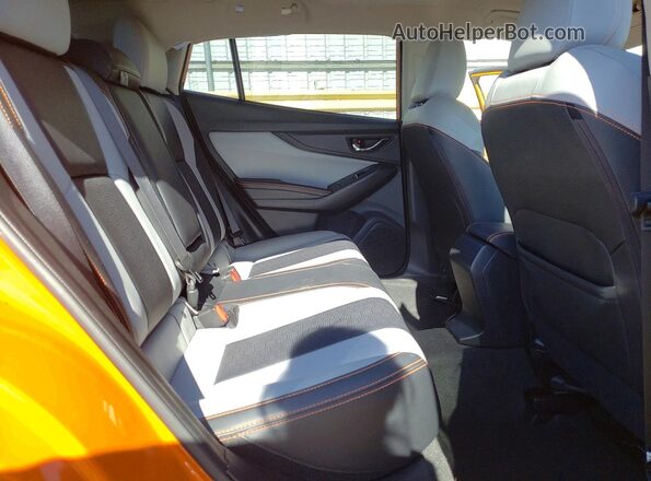 JF2GTALC3JH317972 2018 SUBARU CROSSTREK Orange Rear interior view