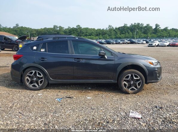 JF2GTAMC4J8238258 2018 SUBARU CROSSTREK Gray Rear interior view
